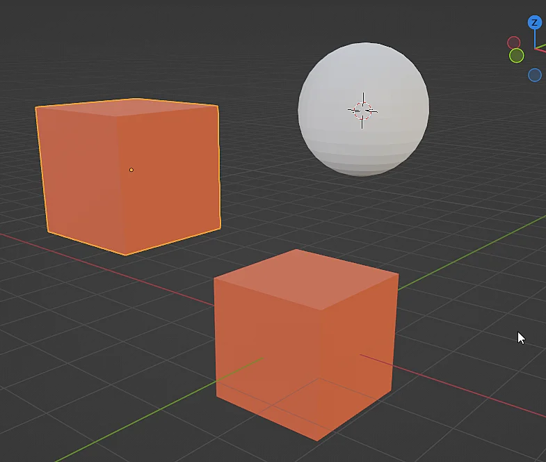 two orange cubes and a sphere in blender, the same material has been reused for both objects.