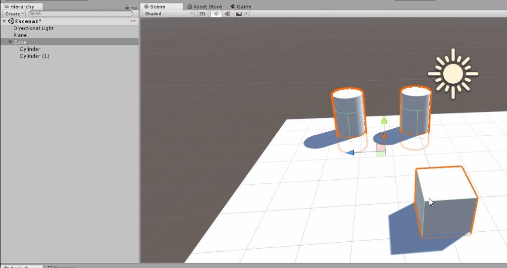 programa unity3d se observa una escena con un plano, un cubo y dos cilindros.