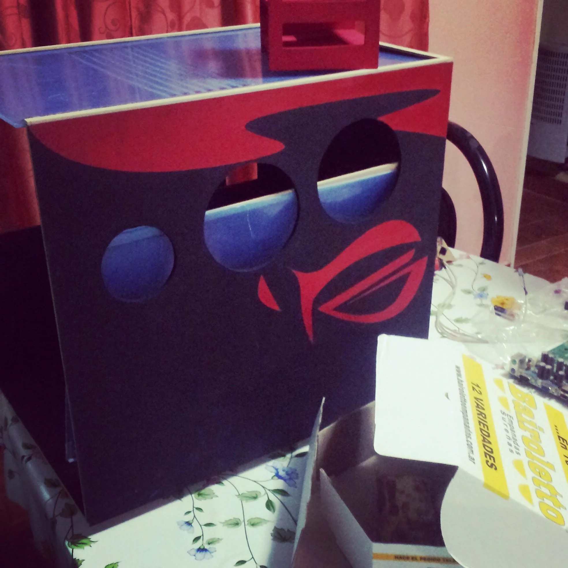 mdf cabinet painted black with red ornaments, acrylics and republic of gamers logo